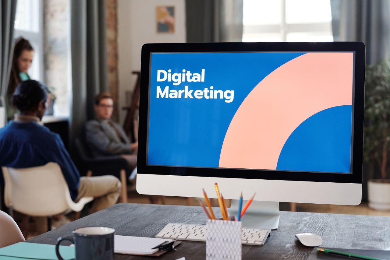 Mastering the First Impression: Your intriguing post title goes here Professionals in a creative office plan digital marketing strategies.